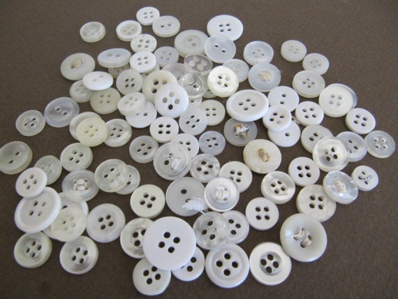 Lot of Small Clear/White Plastic Buttons