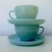 Pair of Fire King Turquoise Blue Cups and Saucers
