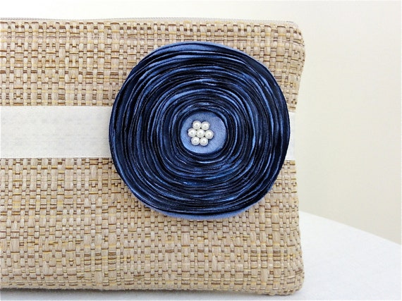 tan woven clutch