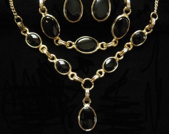Black and Gold Tone Oval Glass Parure