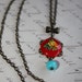 Aqua, Red and Yellow Rose with Dainty Brass Bow Necklace