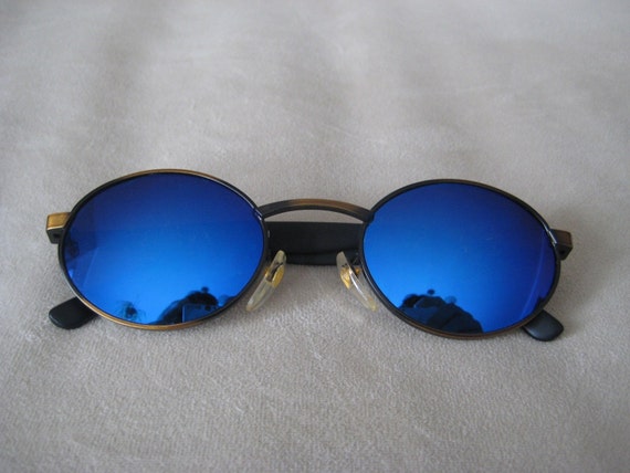 REVO Bronze Oval shaped Sunglasses with Purple/Blue