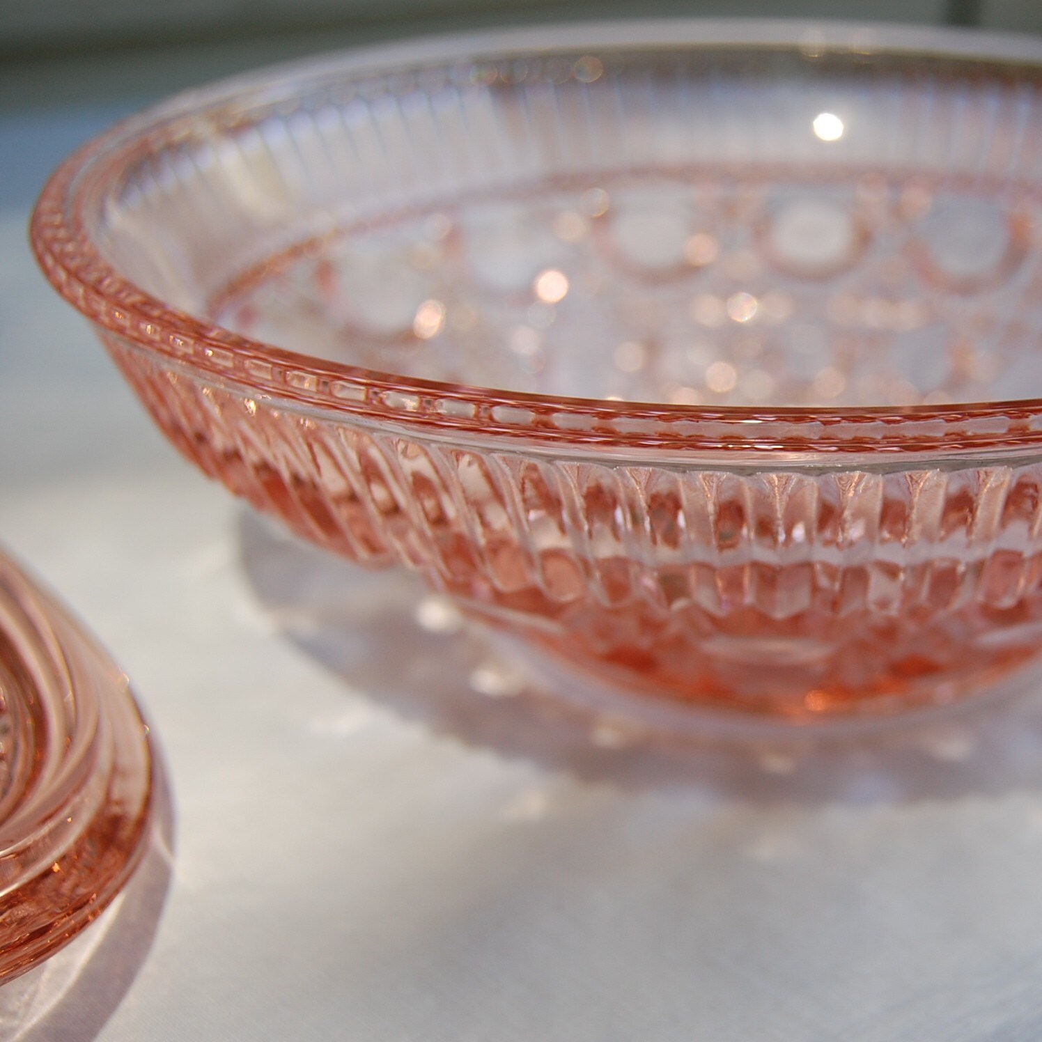 pink depression glass bowl with lid