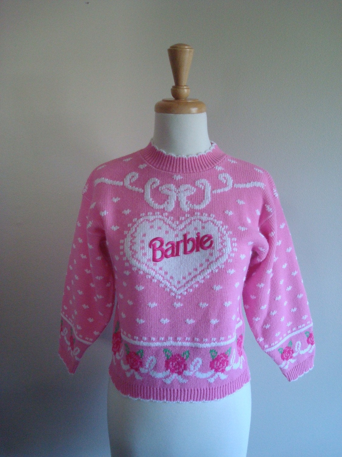 pink graphic sweater