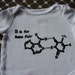 Set of 3 nerdy baby alphabet onesies. A is for amoeba, B is for base pair, C is for cephalopod.