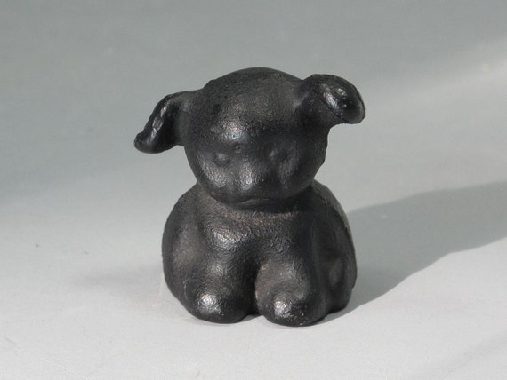 small cast iron figurines