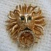 Vintage KJL Lion Door Knocker Brooch, Pin. Kenneth Jay Lane, Gold metal with Green and crystal Rhinestones. Leo.