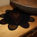 Primitive heart wool penny rug
