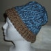 Hand knitted blue and brown beanie for adult