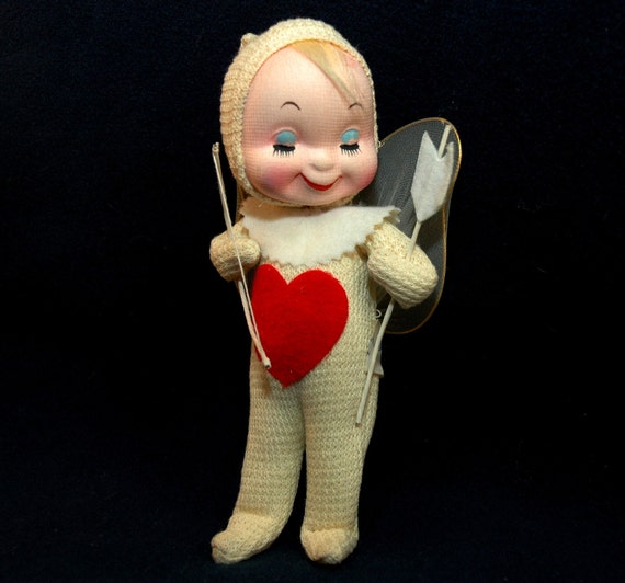 stuffed cupid doll