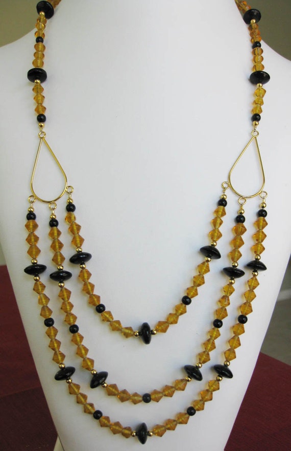 Black & Gold Glass Three Strand Teardrop Necklace