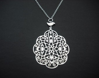 filigree with bird necklace - white gold plated