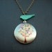 flower tree locket with turquoise bird necklace