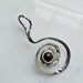 gauged earring / brooch / pendant