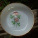 Vintage Oven Fire King ware 10 made in USA Bowl with Gold trim and two pink roses with green leaves on the inside
