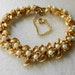 Gorgeous bracelet vintage 1940, Italian - small pearls and lots of little golden flowers -old jewel for a bride-Art.905-