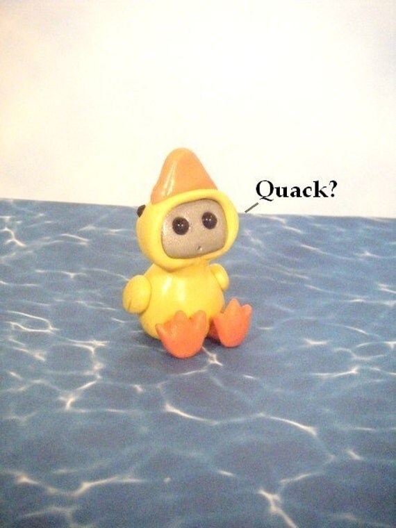 Robot in a Rubber Ducky Costume