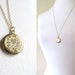 Vintage gold round locket, etched, engraved heart on long delicate 14k gold chain