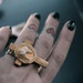 TAXIDERMY COUTURE Coyote Molar Tooth Double Finger Cross ring BRASS