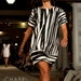 Geometric Stripe Shift with Zebra Fringe Shoulder Detail
