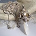 Sterling Cherub and Mother of Pearl Chatelaine Brooch and Baby Rattle