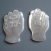 Vintage Carved Mother of Pearl Raised Fist Dangles