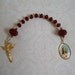 Red single decade rosary with Holy Trinity and Sacred Heart