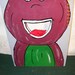 Barney Corn hole game with 4 bean bags