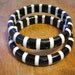 RESERVED For Marcella437451 Vintage Striped layered Bakelite Bangle Bracelet Black and White