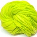 Handspun yarn in bright chartreuse thick and thin merino wool - 50 yards, 3.1 ounces/ 88 grams