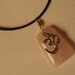 Pewter Om and Rose Quartz Pendant