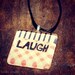 laugh glass pendant necklace