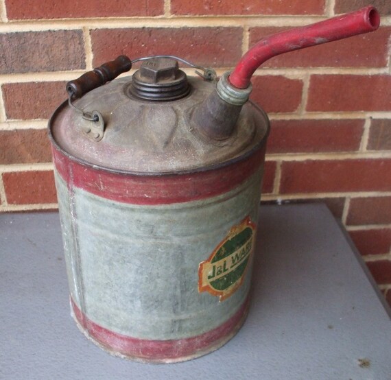 vintage J and L metal gas can with spout