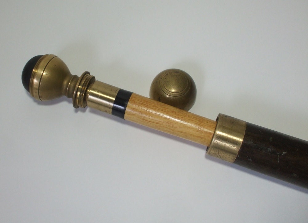 vintage brass and wood pool cue