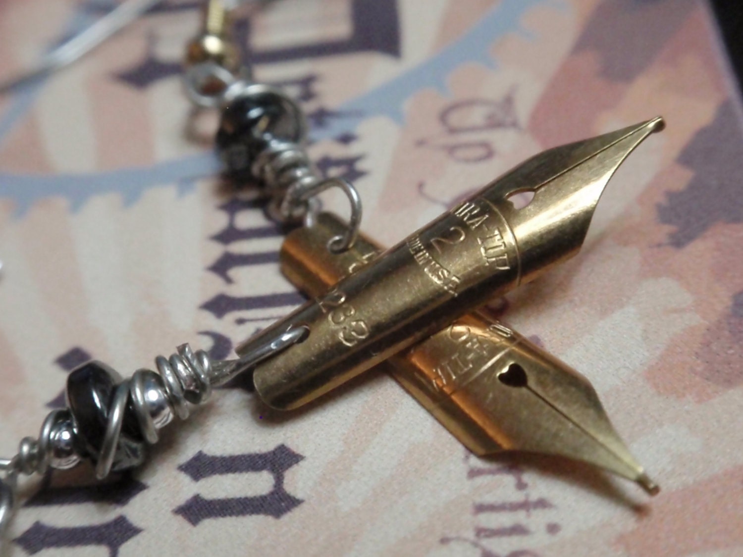 Small Fountain Ink Pen Nib Earrings The Artist Statement. Dura