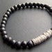 Mens black wooden beaded stretch bracelet with tibetan silver rondelles