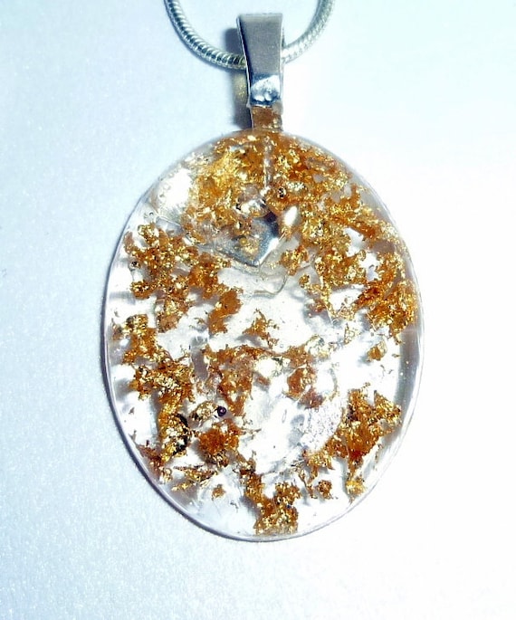 Gold flakes epoxy resin pendant necklace by PenneeDesigns on Etsy