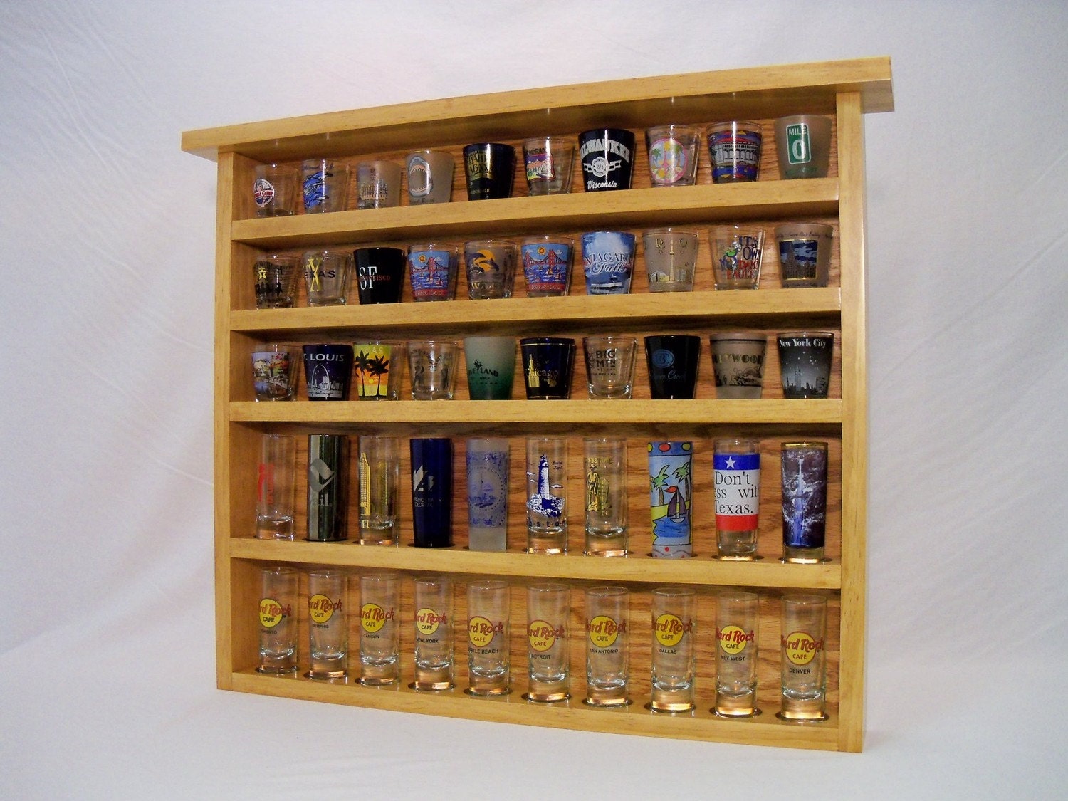 Early American 50 Shot Glass Display Case with Oak Background