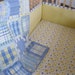 Crib set (quilt, bumper pads, dust ruffle and sheet)