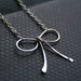 SALE 25% off with code "holiday11" for black friday and cyber monday -- SILVER BOW Necklace -- sterling silver -- free shipping