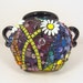 Forget the bouquet... Mom will love this mosaic planter provides showcase for her favorite plant -- OOAK original