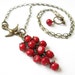 Red Coral Berry Cluster Brass Bird Necklace
