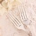 Mr. & Mrs. Wedding Cake Forks: Hand stamped silver plated forks. Floral fluted handle new and lovely with silver storage bag.