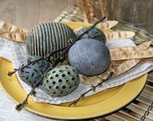 Group of five decorative spheres in dusty yellow, purple, chartreuse and blue green 35