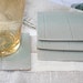 SALE. Set of four stoneware coasters in celadon