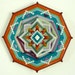 Life Mystery, a 12 inch, all wool Ojo de Dios