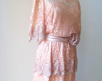 SALE 40% Off. vintage pretty in peach romantic lace dress with rosette sash by Miss Elliette. size Large/X-Large