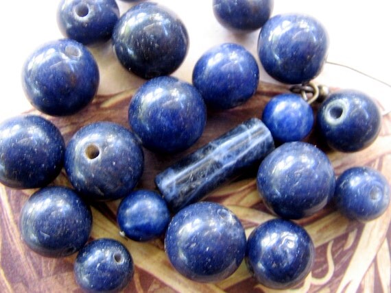 A Deep Blue Stone Atop A Dais Deep Blue Stone Beads