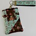 Brown, Aqua & Pink Floral Phone Case with Wristlet with Back Zipper Pocket