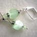 Luminous sea green satin glass earrings
